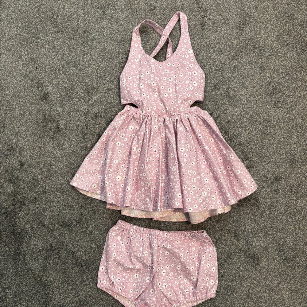 Little People Rocx light purple with white and dark purple flowers pinafore